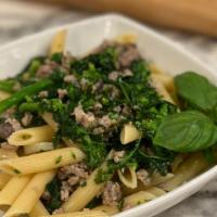 Penne, Broccoli Rabe & Sausage · Penne, Broccoli Rabe & Sweet sausage served in roasted garlic & olive oil sauce
