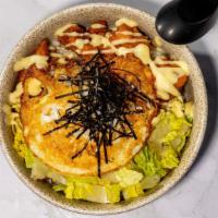 Kara Age Don · Rice bowl topped with breaded and fried chicken, pan-fried egg, seaweed and vegetable with s...