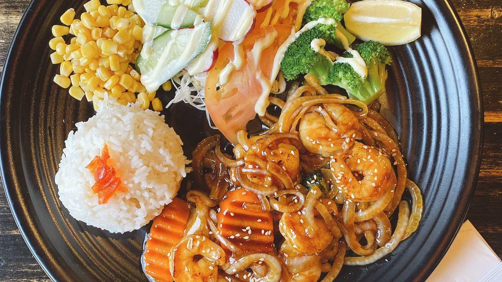Shrimp Teriyaki · Pan-fried shrimps with teriyaki sauce served with rice, cabbage, com, radish and broccoli.