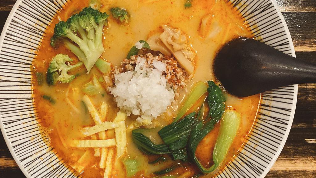 Tantanmen · Spicy noodle soup flavored with mineral salt. Toppings: ground pork, bean sprouts, scallion, onion, broccoli, bok choy, shredded egg, menma.