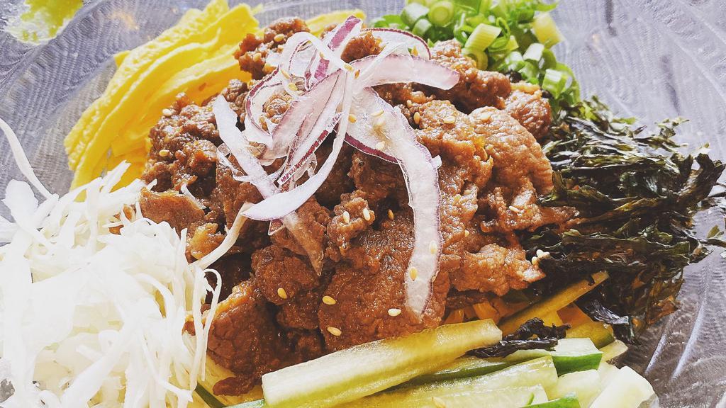 Bulgogi Chuka (Beef Noodle / No Broth) · Warm noodles topped with bulgogi (beef), vegetables and special soy sauce **no soup** toppings: bulgogi (beef), shredded egg, cucumber, cabbage, seaweed, scallion, red onion, sesame seeds.