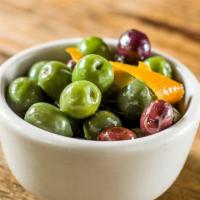 Marinated Olives · Gluten-free, dairy free. Cerignola, black geata, and castelvetrano olives marinated in orang...