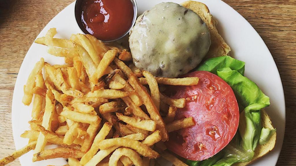 Franks Burger · 8oz house blend dry aged beef. Served on a brioche bun with bibb lettuce, tomato, red onion, pickle & housemade french fries