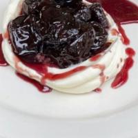 Red Wine Prunes With Mascarpone · A Frankie favorite! Prunes stewed in red wine and spices over mascarpone cheese.