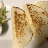  Quesadillas · Your choice of protein. Served with guacamole, lettuce and tomato