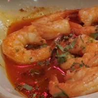 Camarones Scampi · Shrimp in garlic sauce.