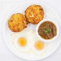 Bolon De Verde · Fried mashed green plantains stuffed with choice of: -served beef stew and eggs queso / cheese