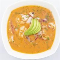 Ceviche Vuelve A La Vida · Includes shrimp, fish, calamari, and octopus. Served with plantain chips and toasted corn or...