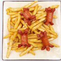 Salchipapa · Fried hot dog slices served with french fries.