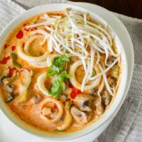 Tom Yum Noodle Soup · Spicy. Hot and sour. Thin rice noodles with mushrooms, bell peppers, fish balls, and bean sp...