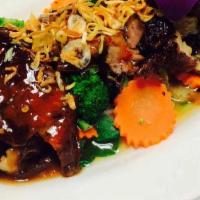 Duck Tamarind · Spicy. Fried crispy duck, steamed vegetables, carrots, and American broccoli with tamarind s...