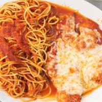 Breast Of Chicken Parmigiana · Lightly breaded chicken cutlet topped with mozzarella cheese and homemade tomato sauce. Serv...