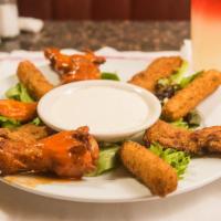 Midnight Appetizer Sampler · Three Mozzarella sticks, three chicken wings and three chicken fingers.