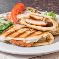 Chicken Cutlet Panini · Chicken cutlet, gravy and melted Mozzarella cheese. Served on flat bread.