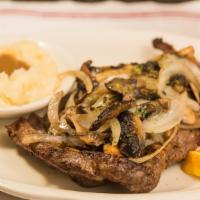 Rib Steak (12 Oz.) · Served with potato, vegetable, and a cup of soup or salad.