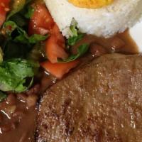 Carne Asada · Grilled steak, rice, beans, salad, plantains, avocado and corn cake.