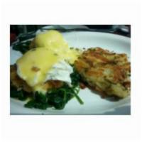 Maryland Lump Crab And Lobster Cake Benedict · Chive hollandaise sauce.