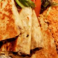 Quesadillas A Las Banderas · Three corn tortillas filled with your choice of meat and cheese. Served with a side of salad...