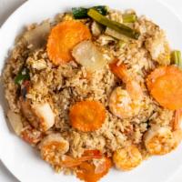 Bangkok Fried Rice · Fried rice with your choice of chicken, beet shrimp or squid, egg, onion, carrot, tomato and...