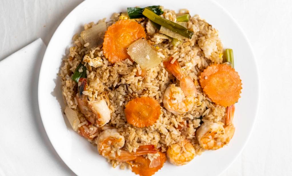 Bangkok Fried Rice · Fried rice with your choice of chicken, beet shrimp or squid, egg, onion, carrot, tomato and scallion.