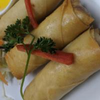Thai Rolls · Thai crispy vegetarian rolls served with sweet plum sauce.
