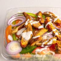 Grilled Chicken Salad · Grilled chicken on top of a fresh garden salad, with lettuce, tomato, onion, cucumber, and s...