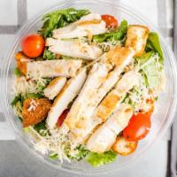 Classic Grilled Chicken Caesar Salad · Grilled chicken, romaine lettuce, garlic croutons, Parmigiana cheese, grape tomatoes, creamy...