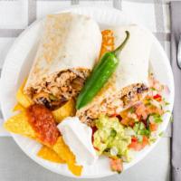 Burrito · Filled with rice, beans, mild salsa, melted mixed cheese, sour cream, and pico de gallo.