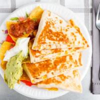 Quesadilla · Filled with pico de gallo, melted mixed cheese, and served with salsa and sour cream.