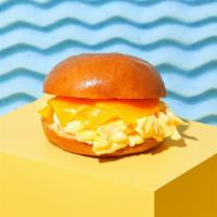 Egg And Cheese · A fried egg and your choice of cheese on a brioche bun.