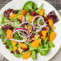 The Palma Salad · Spring mix with walnuts, craisins, raisins, red onion, oranges and citrus vinaigrette.
