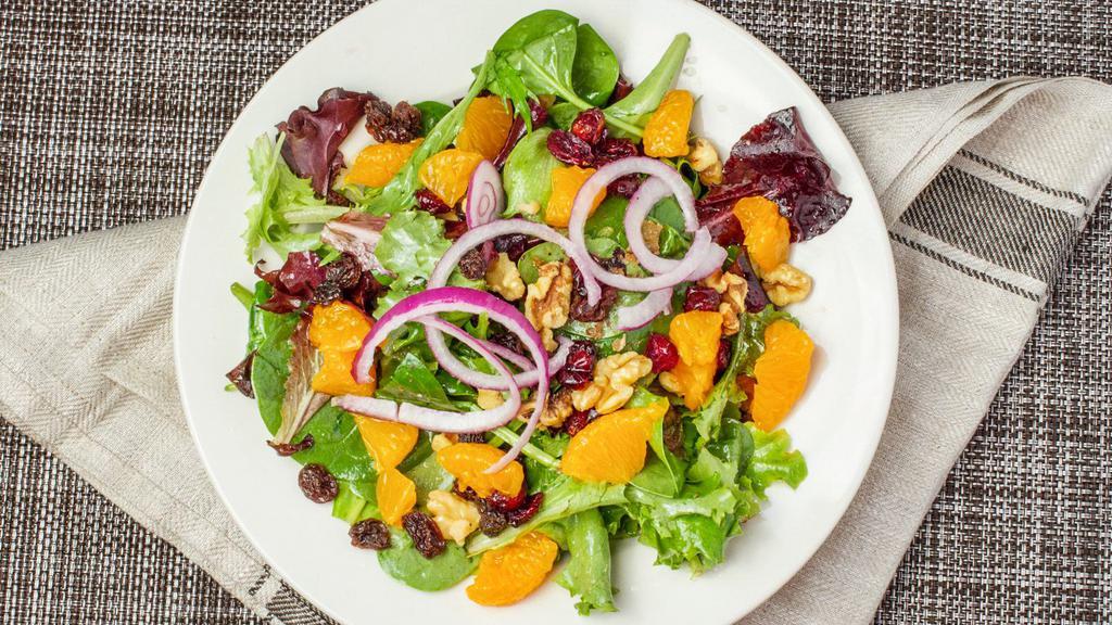 The Palma Salad · Spring mix with walnuts, craisins, raisins, red onion, oranges, and citrus vinaigrette.