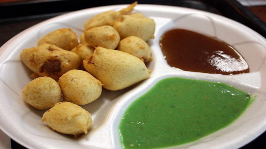 Paneer Poppers · Home-made deep-fried cheese cubes in chickpea flour.