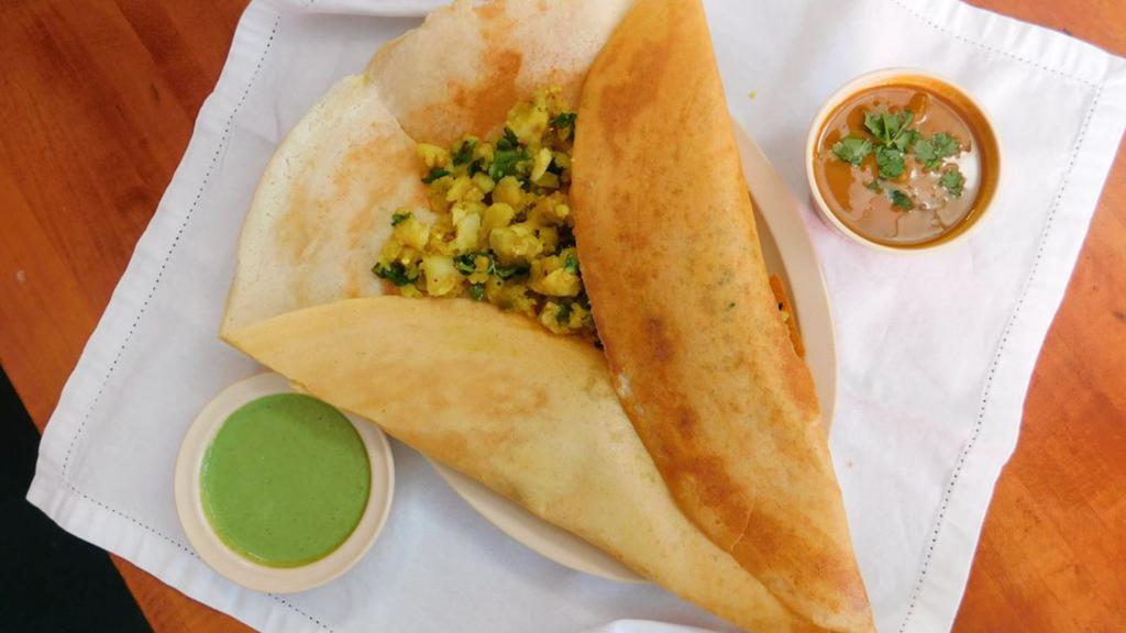 Masala Dosai · A rice and lentil crepe with a variety of fillings.