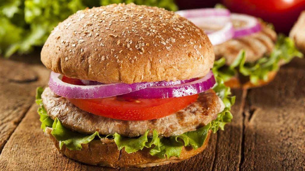Turkey Burger · Juicy, grilled 1/4 pound ground turkey patty topped with fresh lettuce, tomato and onions with pickles, ketchup, mustard and mayo. Add on as many toppings you'd like!