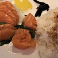Sake Don · Sliced of salmon on a bed of seasoned rice. Served with choice of side.