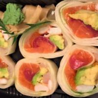 Naruto Roll · Salmon, tuna, yellowtail, shrimp, avocado, and caviar wrapped with thin cucumber.