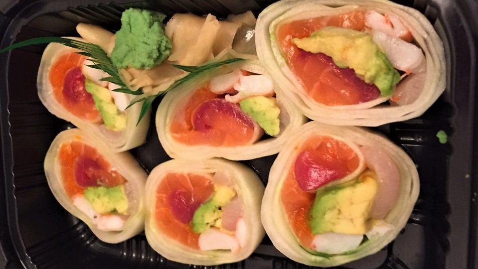 Naruto Roll · Salmon, tuna, yellowtail, shrimp, avocado, and caviar wrapped with thin cucumber.