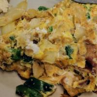 German Omelette · Peppers, onions, bacon and home fried potatoes