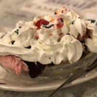 Banana Split · Specialty of the house. Two scoops, topping, banana , whip cream and cherry