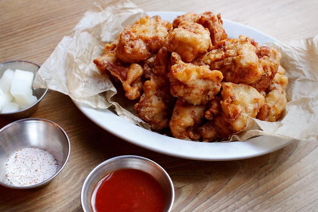 Small Kfc · Boneless Korean-Fried-Chicken with homemade sweet & sour sauce and radish pickles