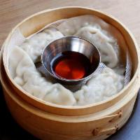 Han Dumplings · Handcrafted boiled dumplings with pork, napa cabbage & tofu