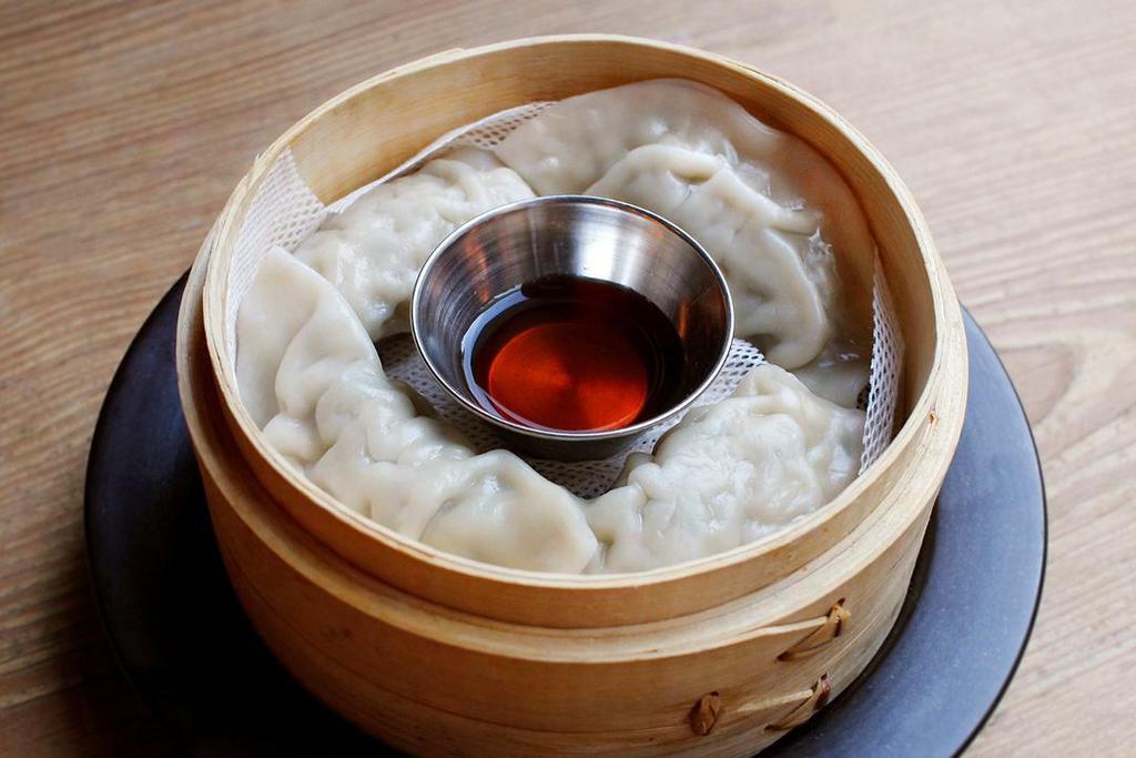 Han Dumplings · Handcrafted boiled dumplings with pork, napa cabbage & tofu