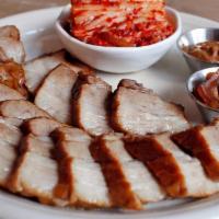 Large Bossam · Slow-cooked pork belly with homemade bossam Kimchi, pickles & jalapeño soybean paste. (1-2 s...