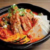Kimchi Jjim · Homemade Kimchi & pork ribs with squash, tofu & anchovy broth (64oz) (2-3 servings)