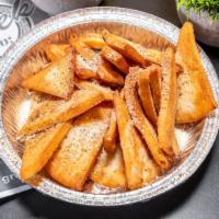 Fried Pita Chips · Served with tsatziki sauce.