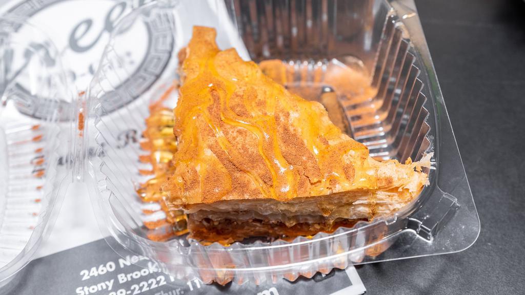 Baklava · Homemade. Layered phyllo with almonds and walnuts topped with cinnamon and honey.