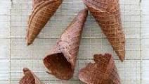 Chocolate Waffle Cone · Side order of a single waffle cone dipped in chocolate. *Ice Cream Not Included* :)