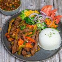 Wednesday: Carne Salteada Con Vegetales · -sautéed steak with vegetable served with rice, salad and soup or beans.
-Carne salteada con...