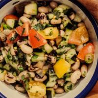 Black Eyed Pea Salad · Black eye peas, cucumber, tomato, pepper, parsley, moringa-ginger vinaigrette.